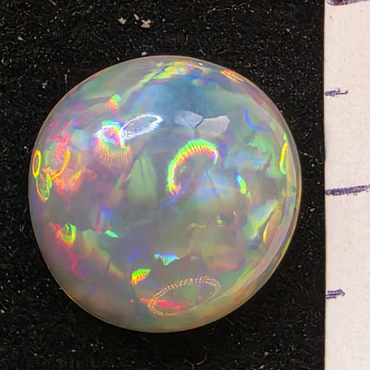 Crystal Opal special Ethiopian Welo, 6.55 ct round polished, natural, intense Play-of-Colour