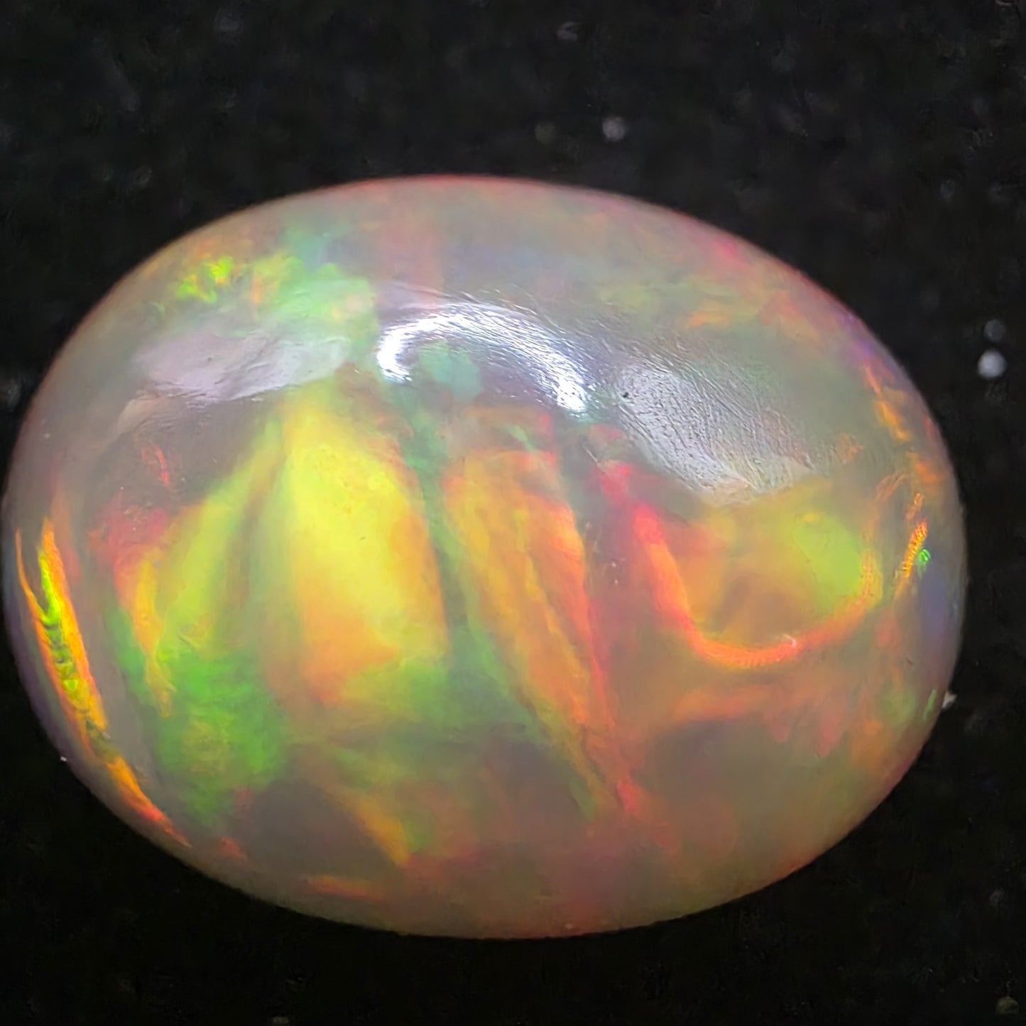 Black Opal special Ethiopian Welo, 21.2 ct oval polished, natural, intense Play-of-Colour