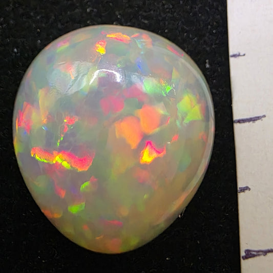 White Opal special Ethiopian Welo, 8.2 ct pear polished, natural, intense Play-of-Colour