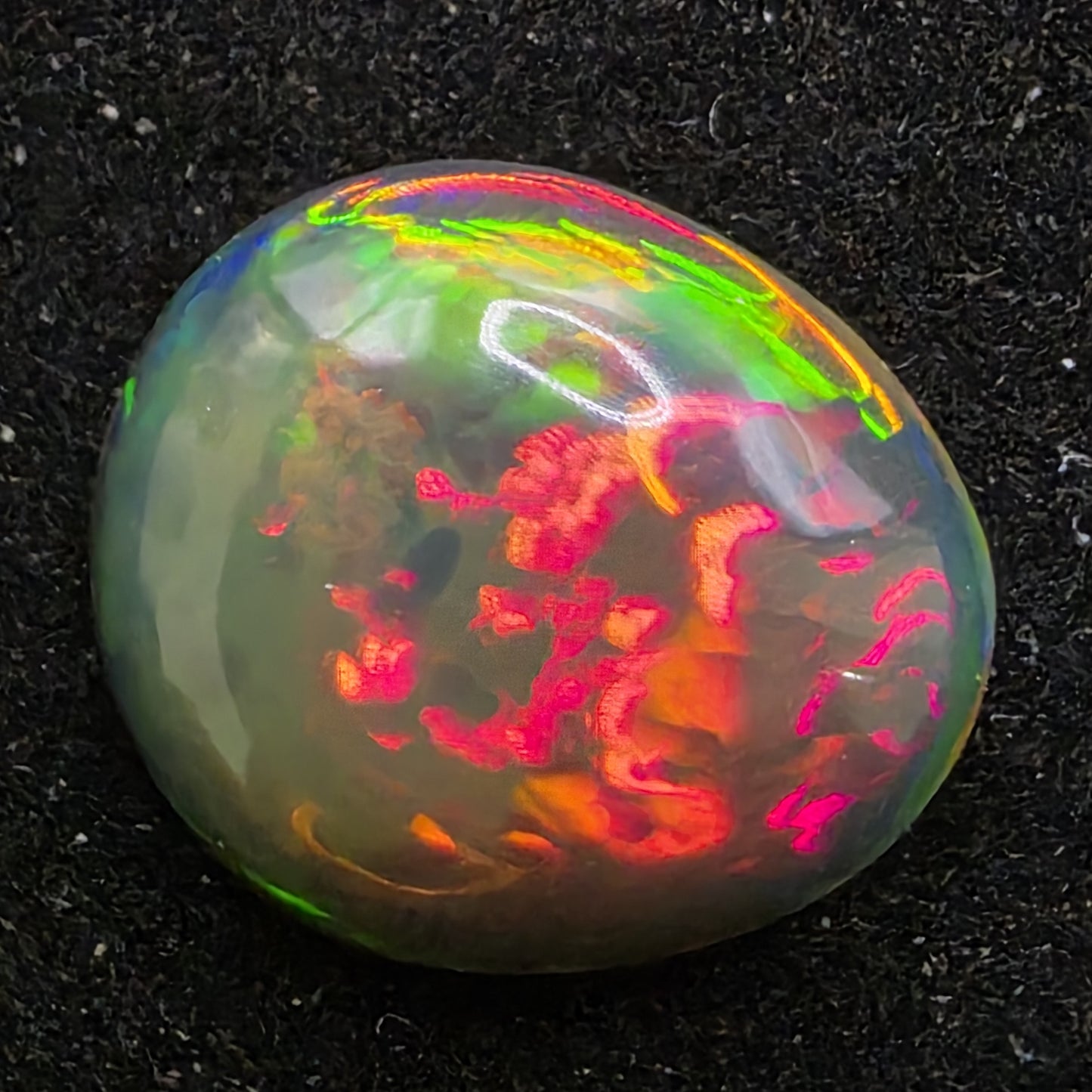 Black Opal special Ethiopian Welo, 3.25 ct pear polished, natural, intense Play-of-Colour