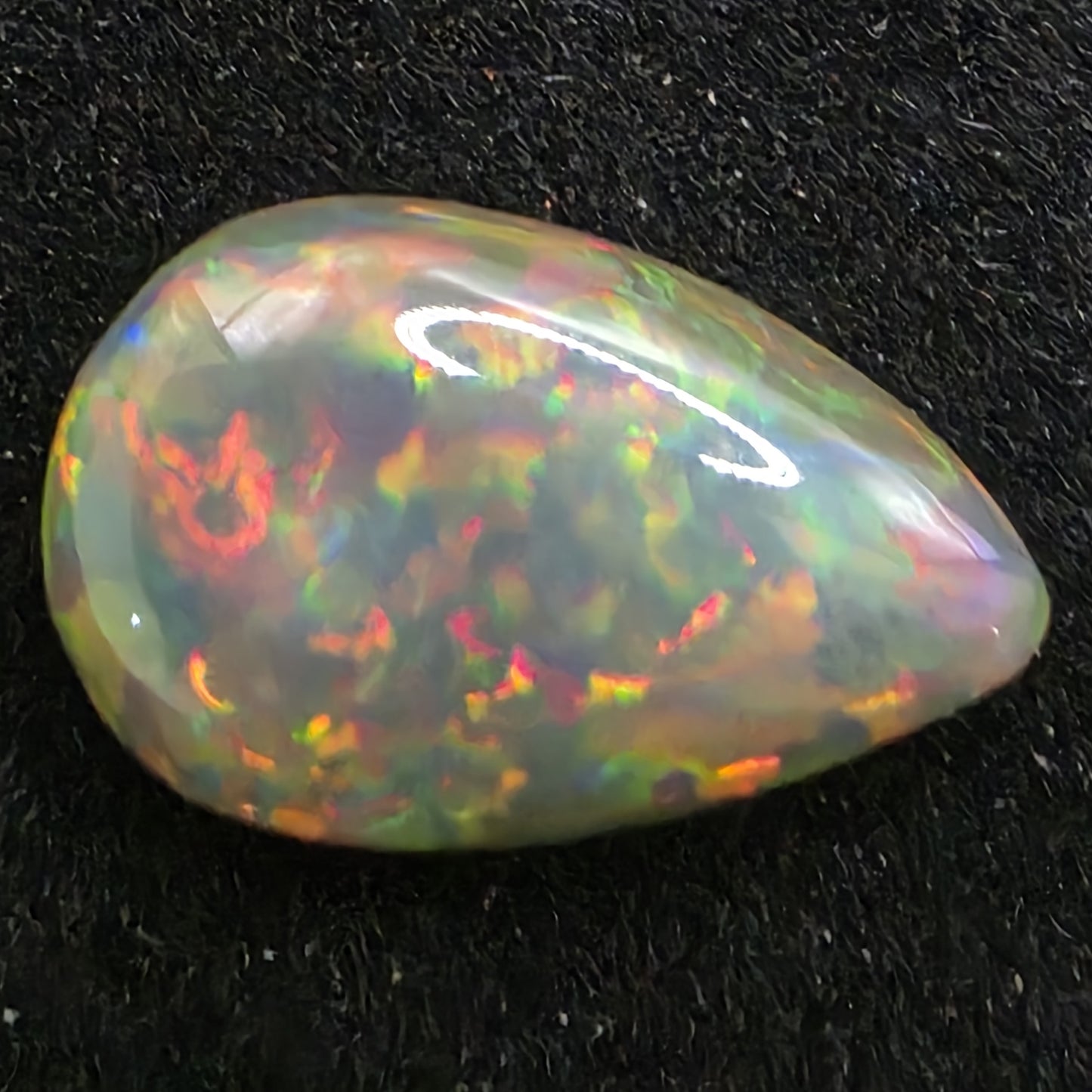 Black Opal special Ethiopian Welo, 3.45 ct pear polished, natural, intense Play-of-Colour