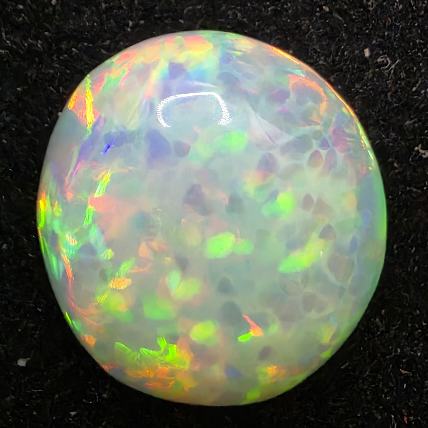 Black Opal special Ethiopian Welo, 2.1 ct round polished, natural, intense Play-of-Colour