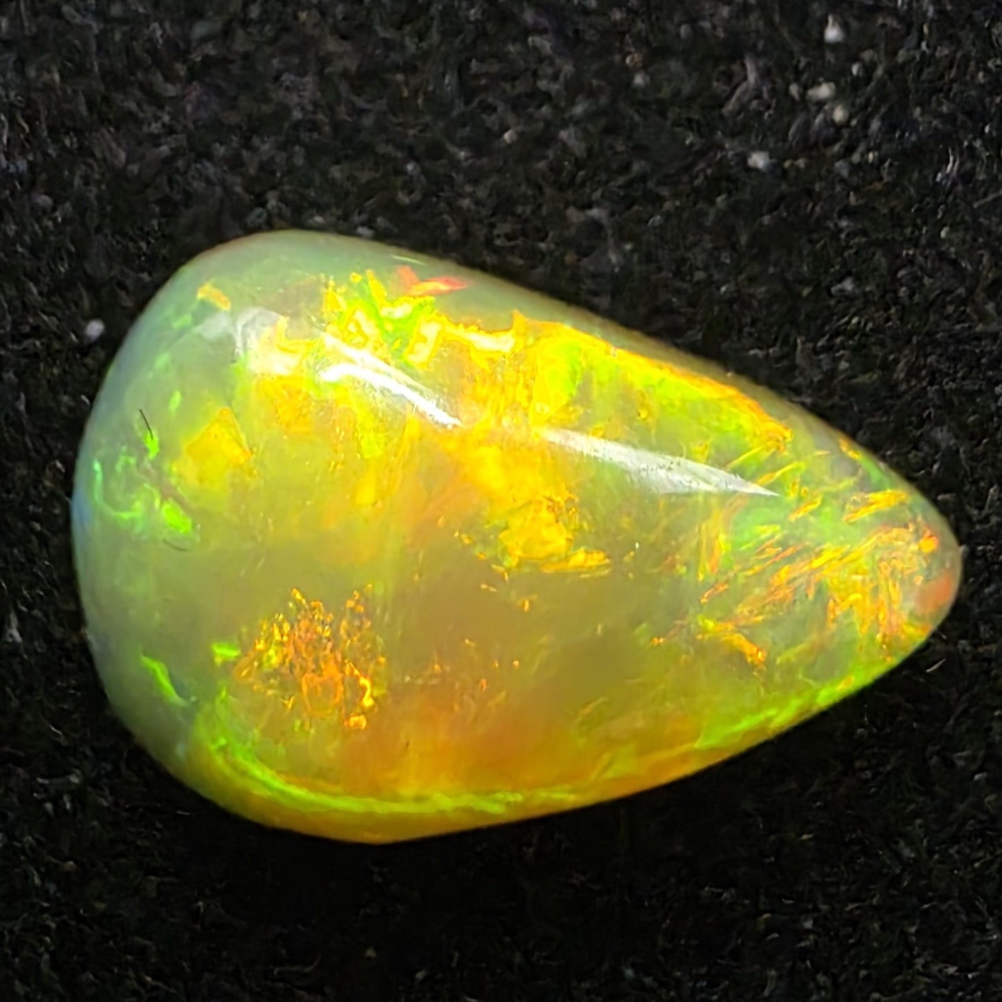 Black Opal Ethiopian Welo, 1.15 ct pear polished, natural