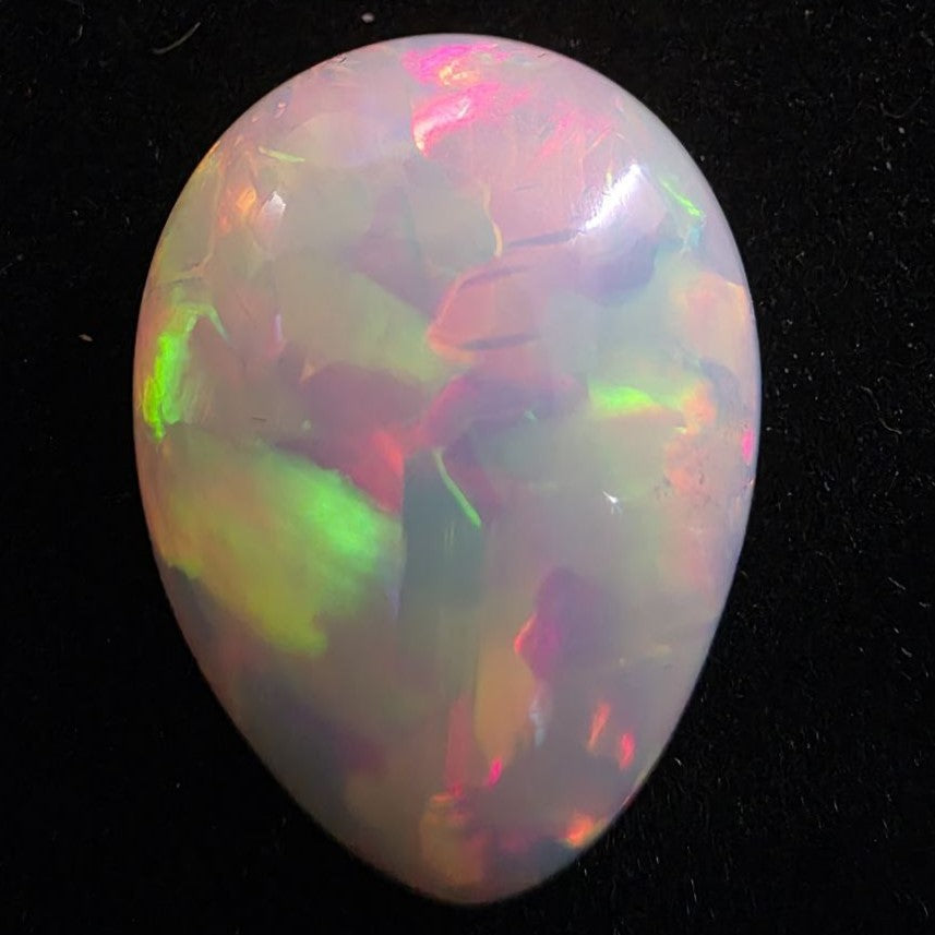 White Opal special Ethiopian Welo, 22.9 ct pear polished, natural, intense Play-of-Colour