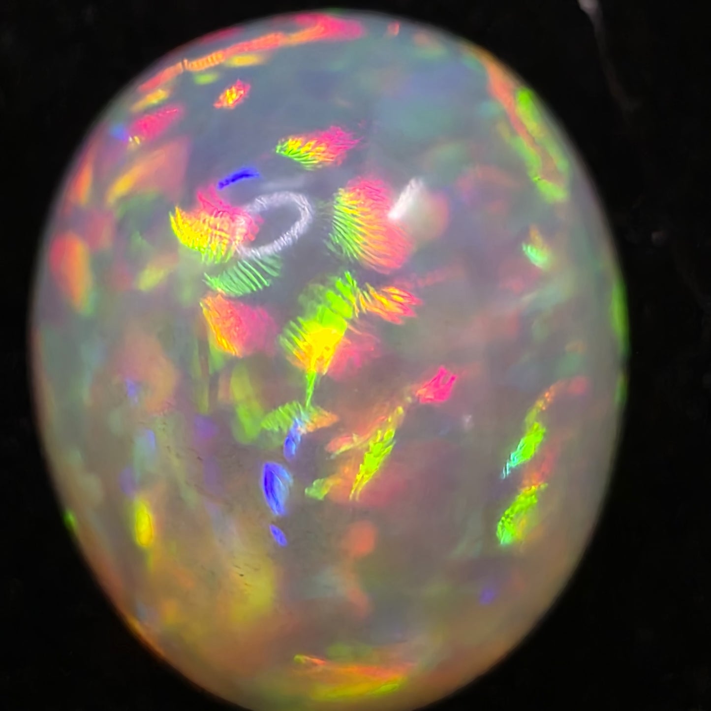 White Opal special Ethiopian Welo, 10.45 ct freeform polished, natural, intense Play-of-Colour