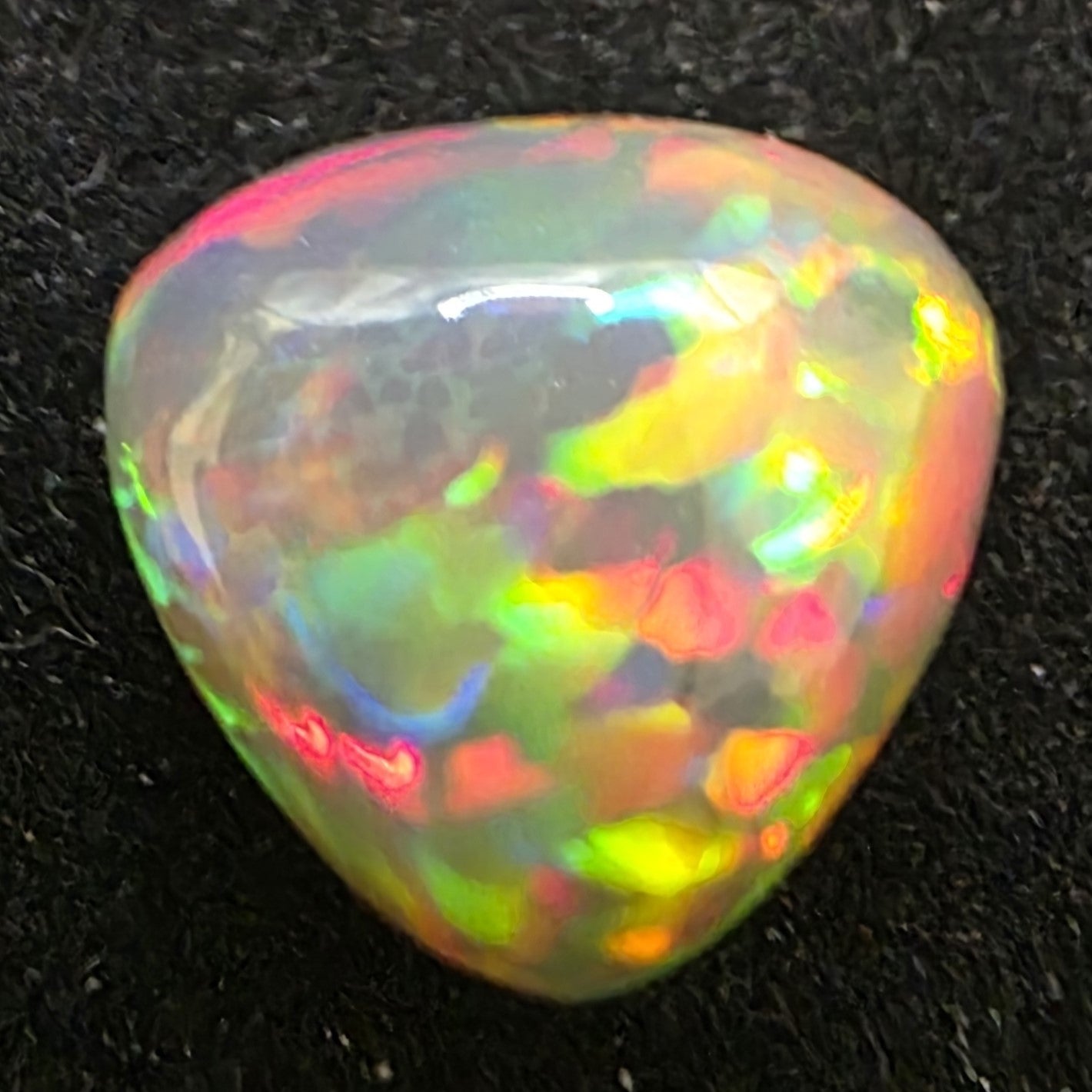 Black Opal special Ethiopian Welo, 4 ct freeform polished, natural, intense Play-of-Colour
