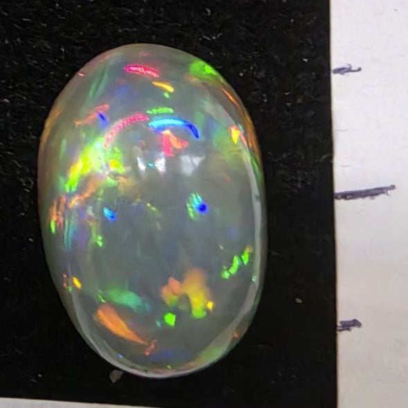 Black Opal special Ethiopian Welo, 4.05 ct oval polished, natural, intense Play-of-Colour