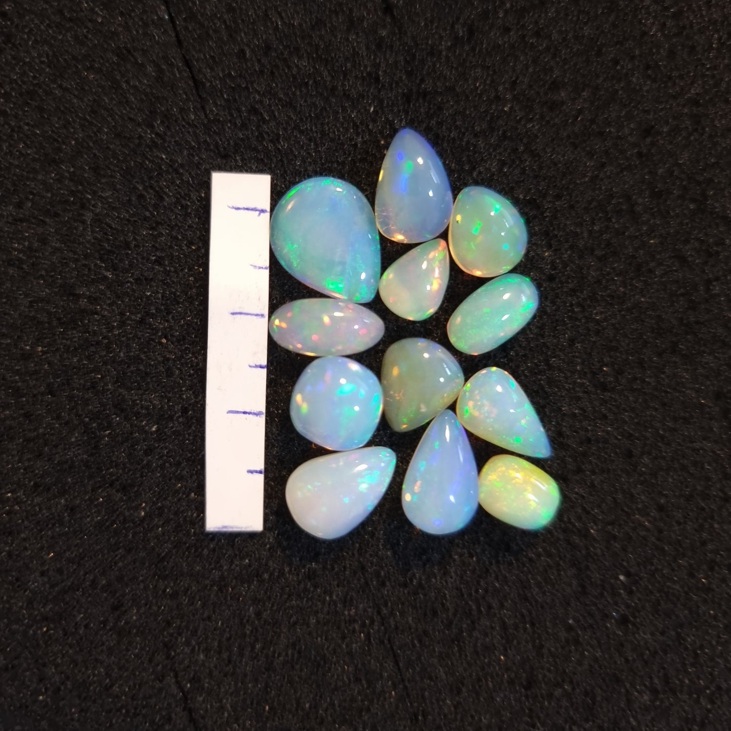 Micro-lot of 12 stones Mixed Opal Ethiopian Welo, 20 ct oval polished, natural