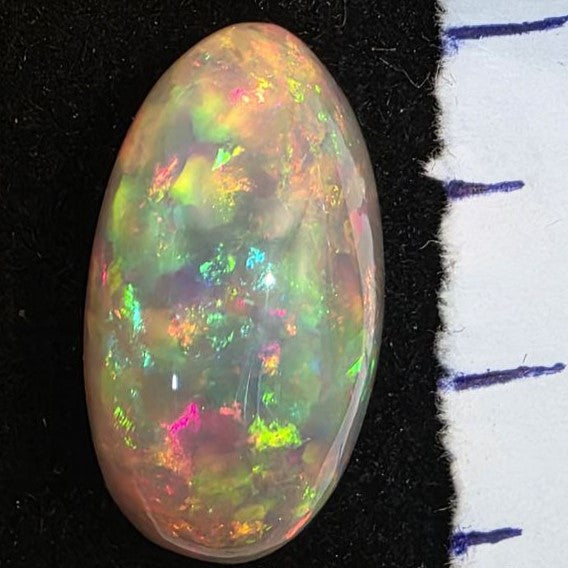 White Opal special Ethiopian Welo, 12.25 ct freeform polished, natural, intense Play-of-Colour