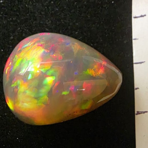 Black Opal special Ethiopian Welo, 23.55 ct pear polished, natural, intense Play-of-Colour