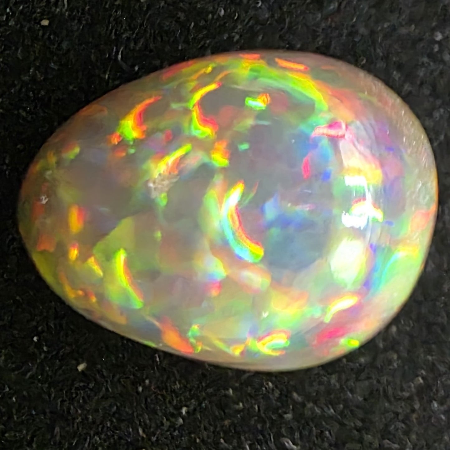 Black Opal special Ethiopian Welo, 6.15 ct pear polished, natural, intense Play-of-Colour