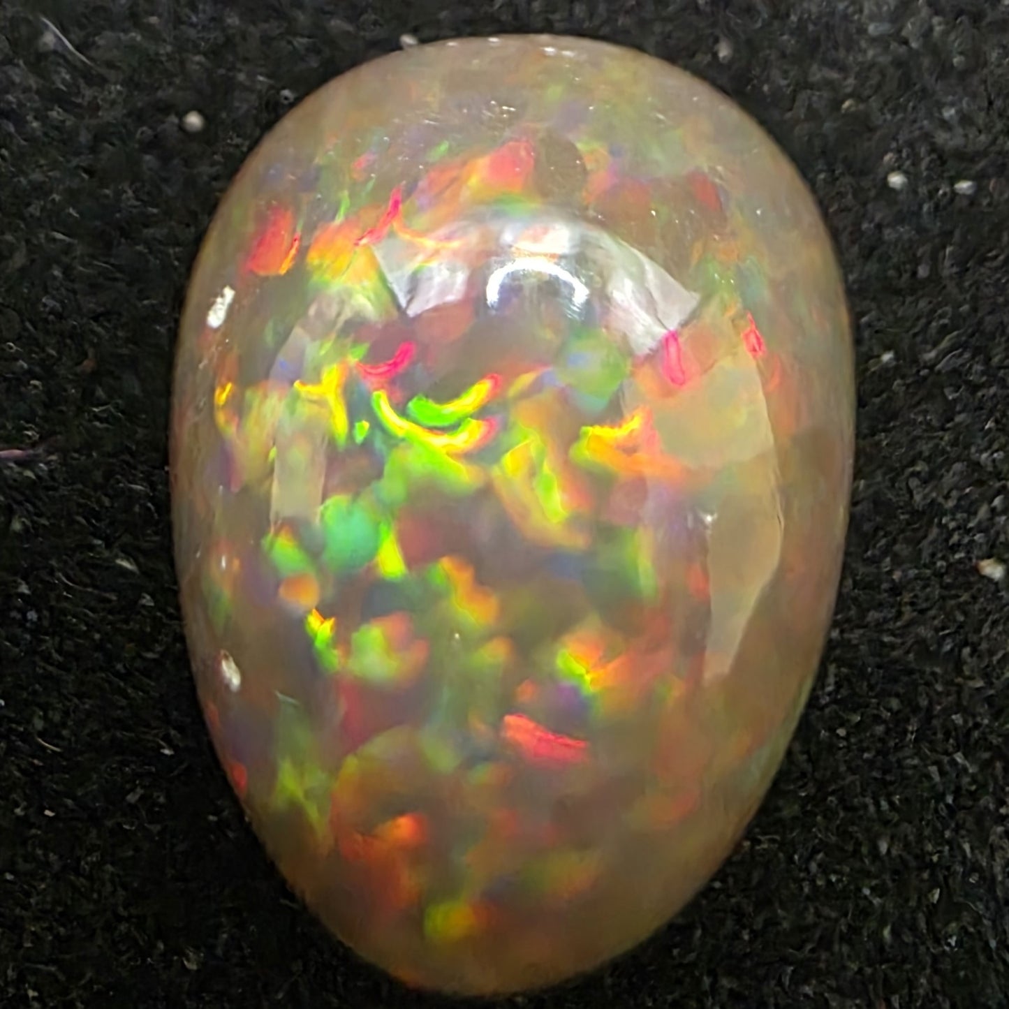 Black Opal special Ethiopian Welo, 7.8 ct pear polished, natural, intense Play-of-Colour