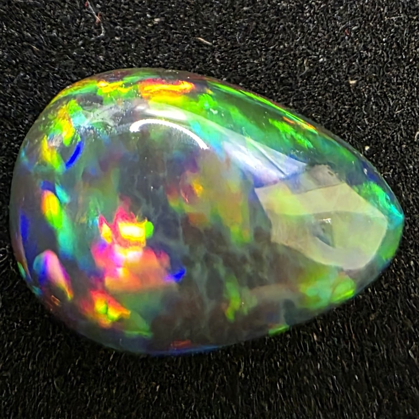 Black Opal special Ethiopian Welo, 3.35 ct pear polished, natural, intense Play-of-Colour