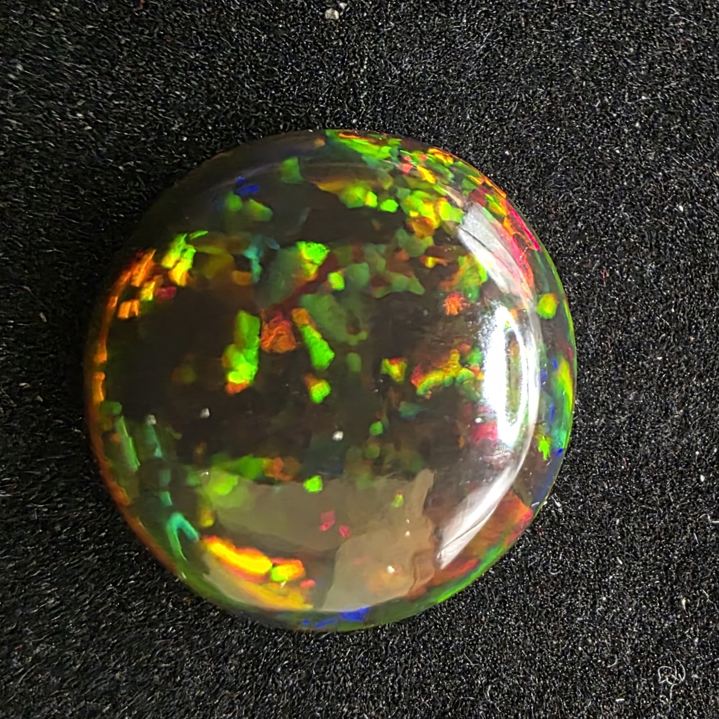 Black Opal special Ethiopian Welo, 6.05 ct oval polished, natural, intense Play-of-Colour