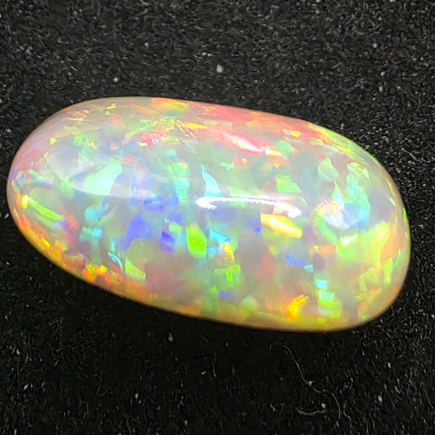Black Opal special Ethiopian Welo, 6.85 ct oval polished, natural, intense Play-of-Colour