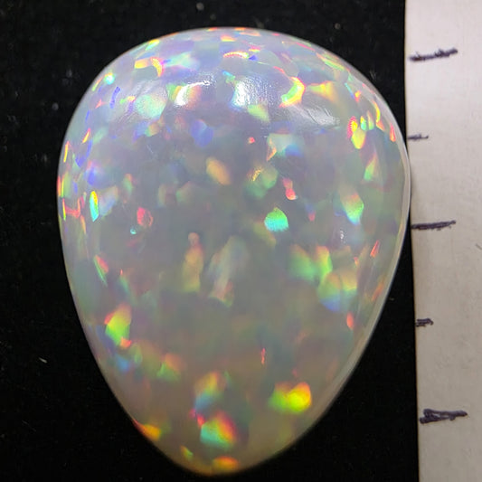 White Opal special Ethiopian Welo, 20.4 ct pear polished, natural, intense Play-of-Colour