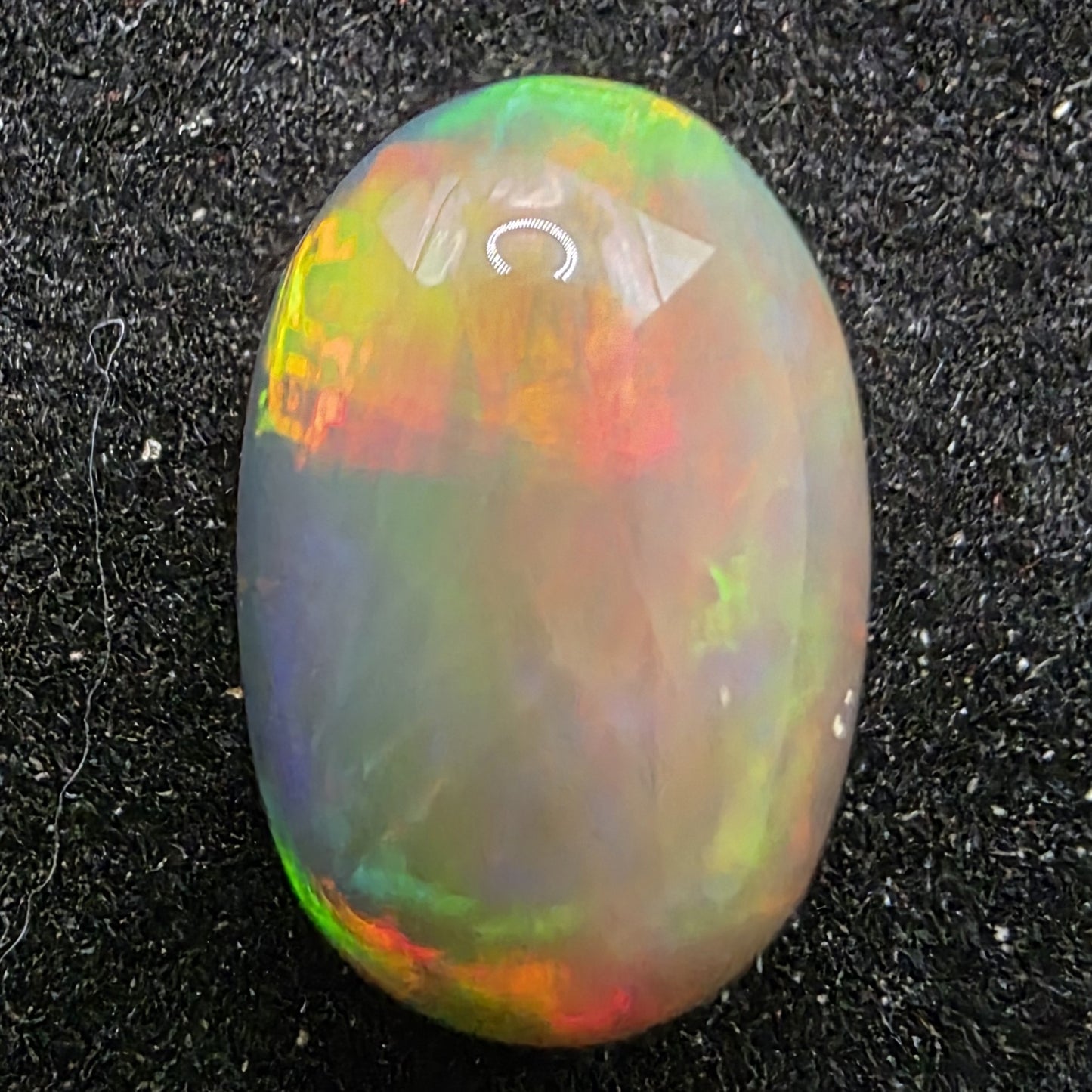 Black Opal special Ethiopian Welo, 3.65 ct oval polished, natural, intense Play-of-Colour