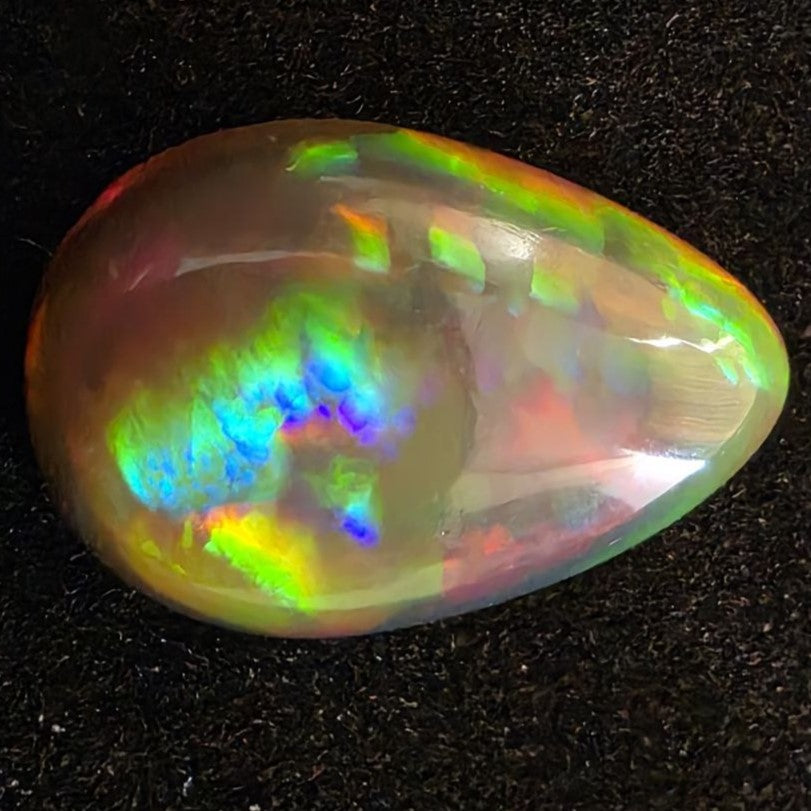 Perfect! Black Opal outstanding Ethiopian Welo, 6.45 ct pear polished, natural, intense Play-of-Colour