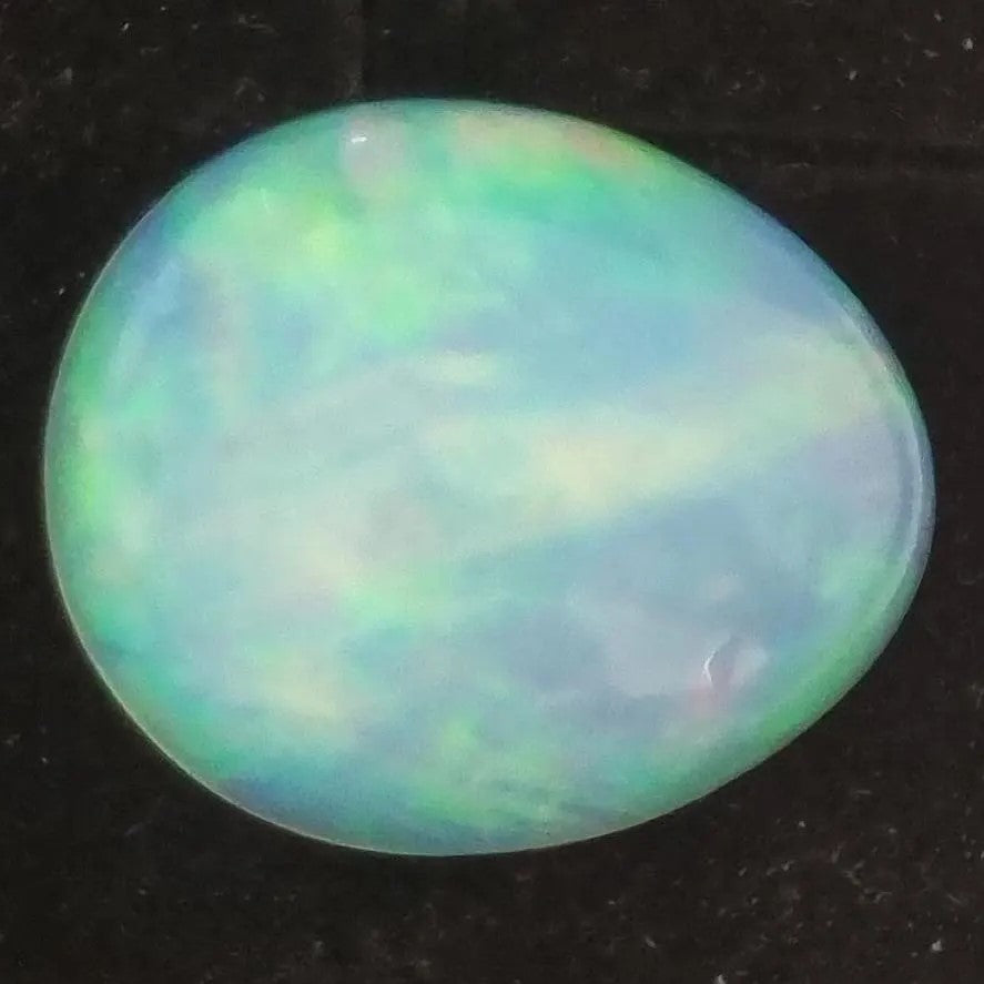 White Opal Ethiopian Welo, 7 ct pear polished, natural