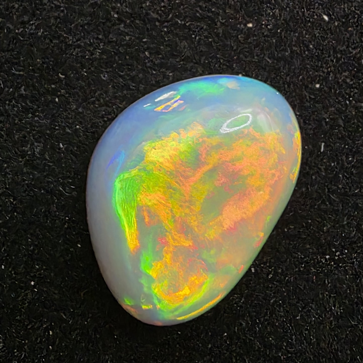 White Opal special Ethiopian Welo, 8.6 ct freeform polished, natural, intense Play-of-Colour