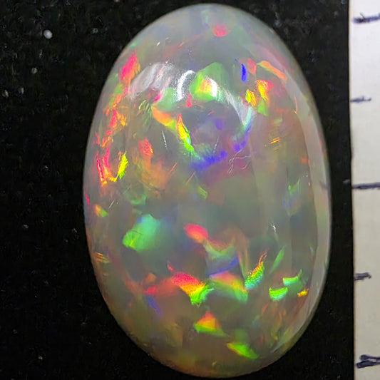 Black Opal special Ethiopian Welo, 12.1 ct oval polished, natural, intense Play-of-Colour