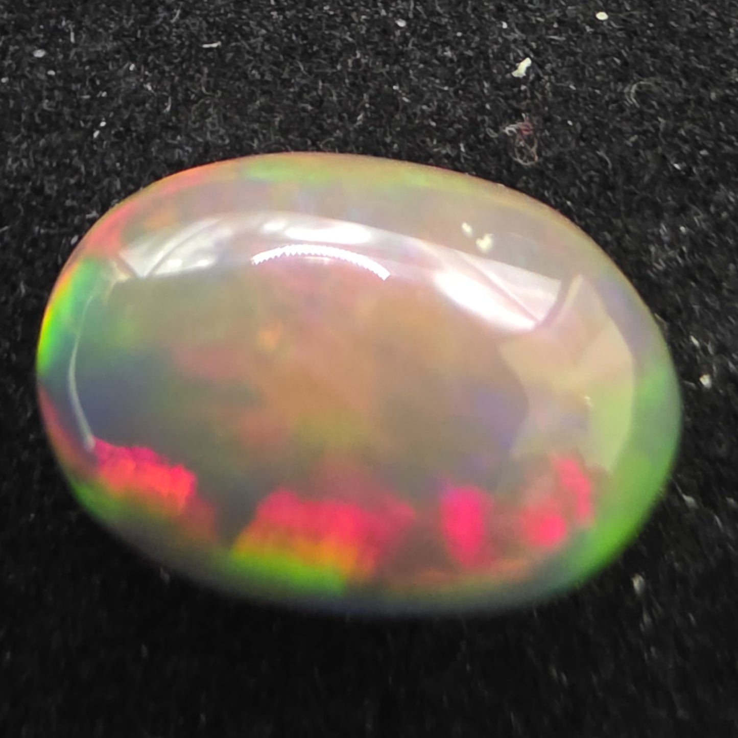 Black Opal special Ethiopian Welo, 3.65 ct oval polished, natural, intense Play-of-Colour