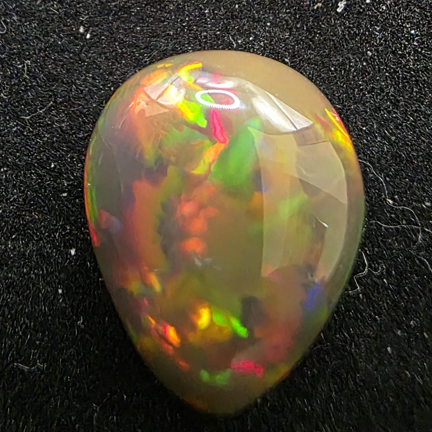Black Opal special Ethiopian Welo, 7.2 ct pear polished, natural, intense Play-of-Colour