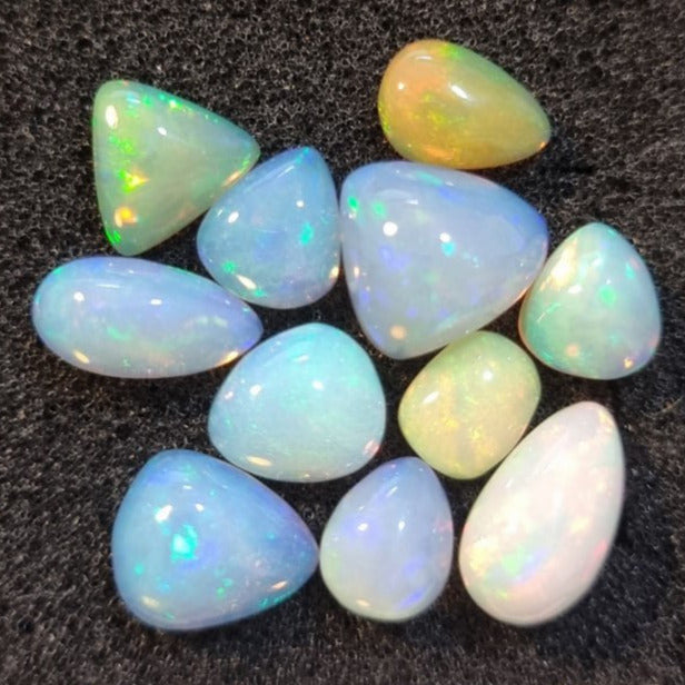 Micro-lot of 11 stones Mixed Opal Ethiopian Welo, 21 ct oval polished, natural