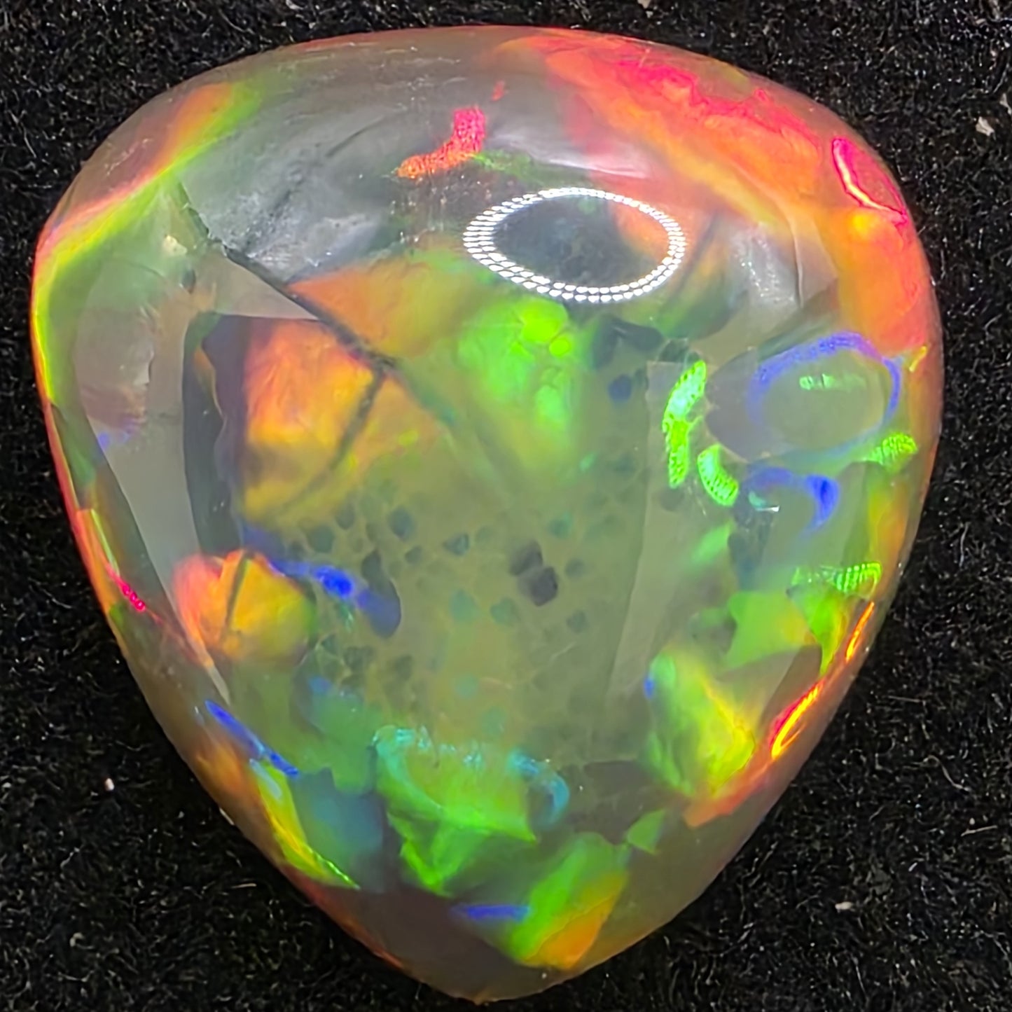 Black Opal special Ethiopian Welo, 4.2 ct pear polished, natural, intense Play-of-Colour
