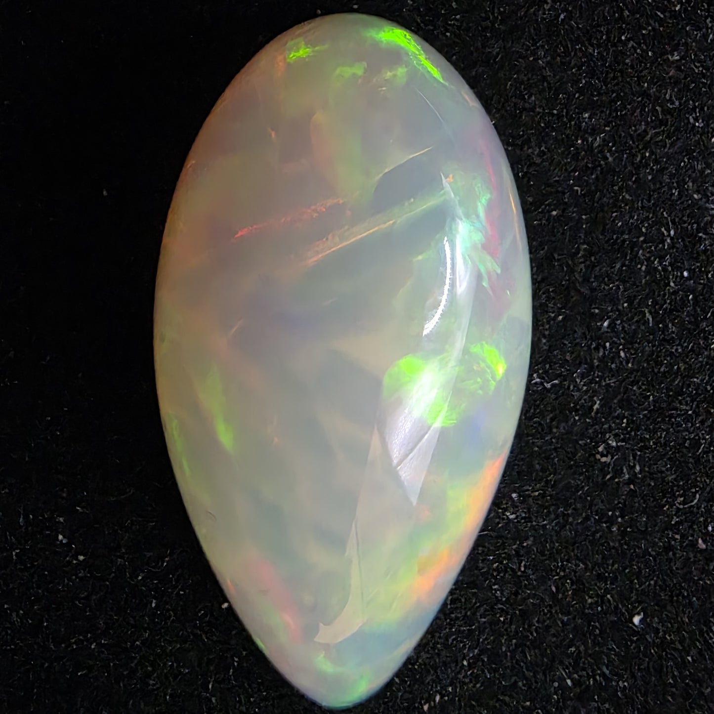 White Opal special Ethiopian Welo, 10.75 ct pear polished, natural, intense Play-of-Colour