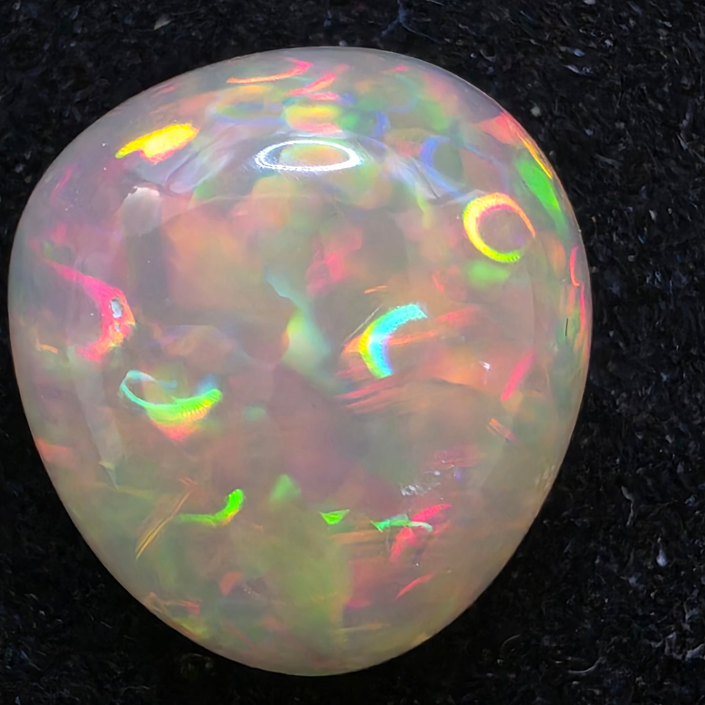 Honey Opal special Ethiopian Welo, 6.4 ct freeform polished, natural, intense Play-of-Colour