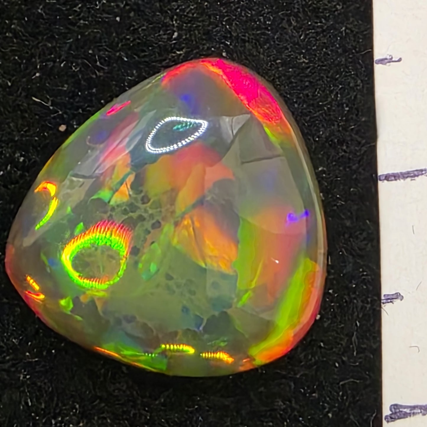 Black Opal special Ethiopian Welo, 4.2 ct pear polished, natural, intense Play-of-Colour