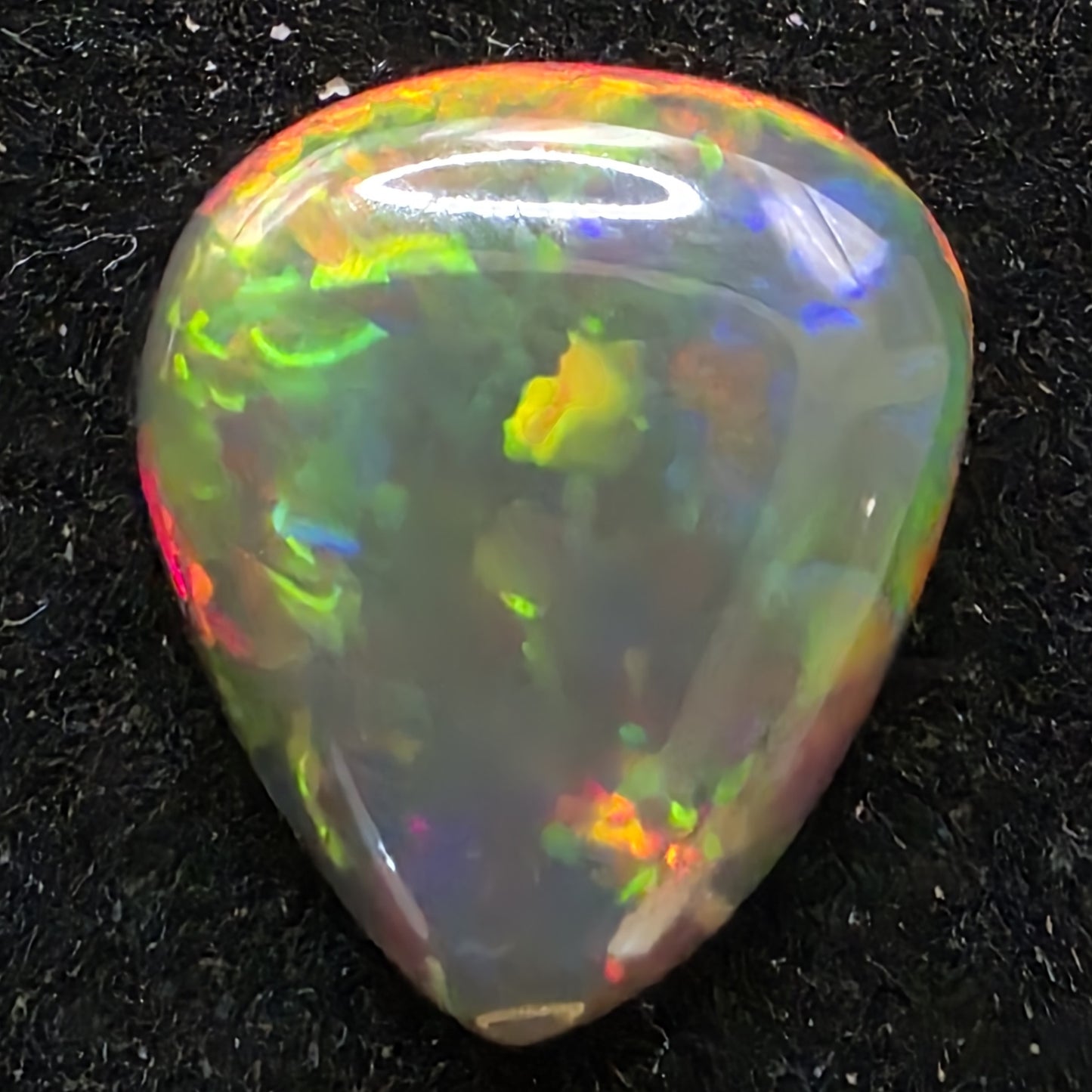 Honeycomb Black Opal special Ethiopian Welo, 3.1 ct pear polished, natural, intense Play-of-Colour