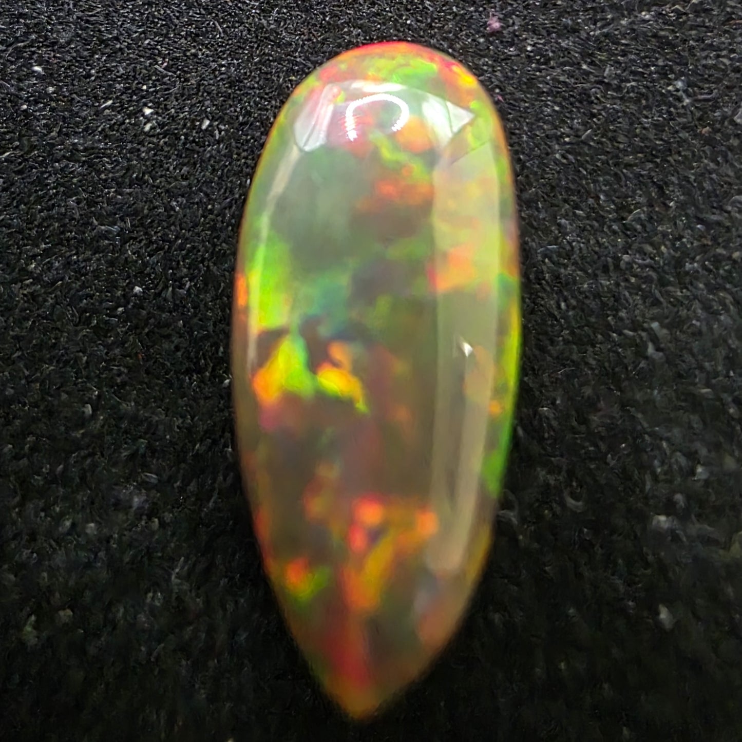 Black Opal special Ethiopian Welo, 2.55 ct pear polished, natural, intense Play-of-Colour