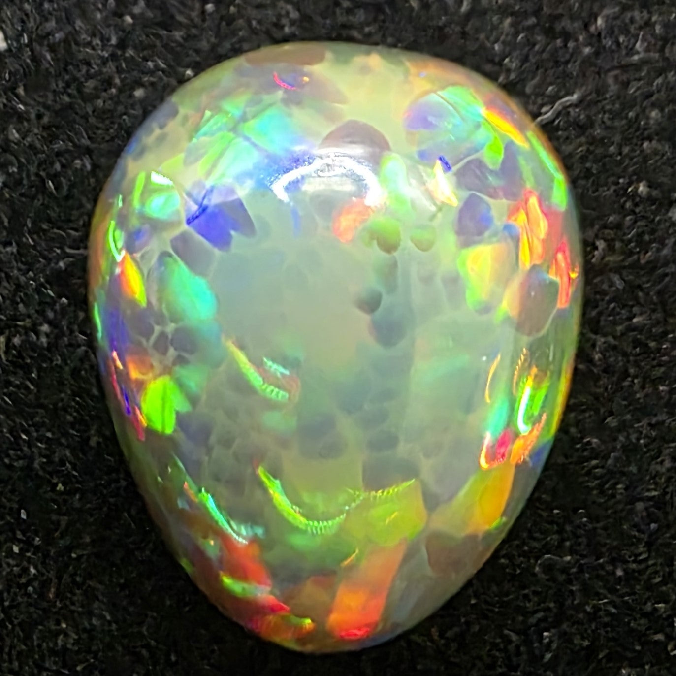 Black Opal special Ethiopian Welo, 3.7 ct pear polished, natural, intense Play-of-Colour