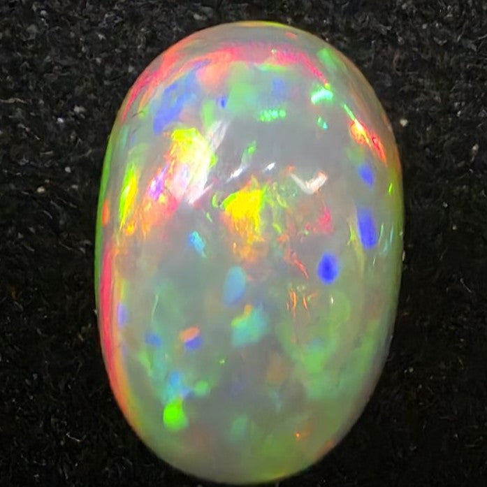 Black Opal special Ethiopian Welo, 4.05 ct oval polished, natural, intense Play-of-Colour