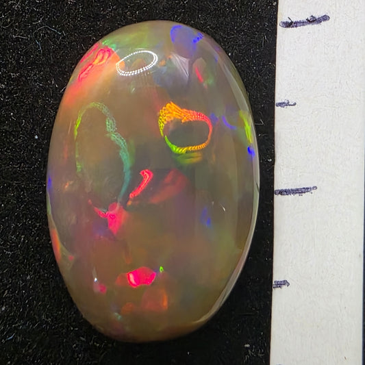 Black Opal special Ethiopian Welo, 6.4 ct oval polished, natural, intense Play-of-Colour