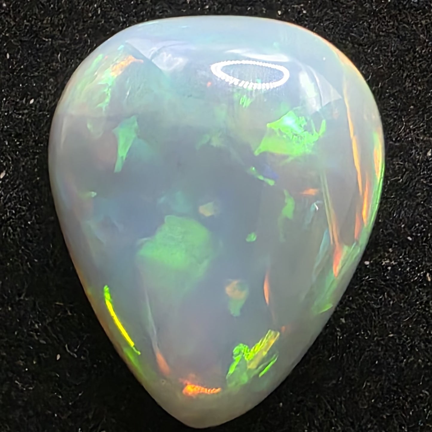 Artsy Black Opal special Ethiopian Welo, 13.85 ct pear polished, natural, intense Play-of-Colour