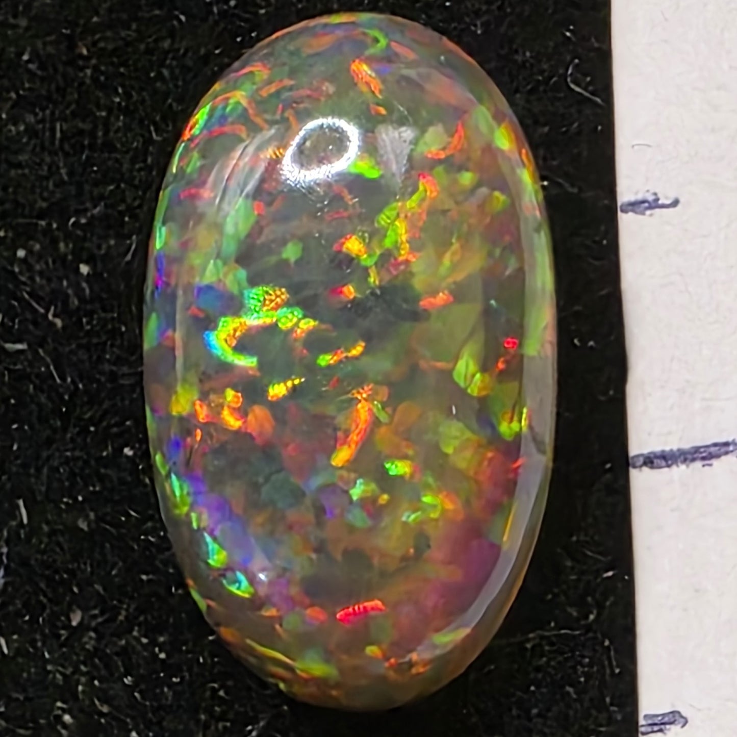 Black Opal special Ethiopian Welo, 3.2 ct oval polished, natural, intense Play-of-Colour