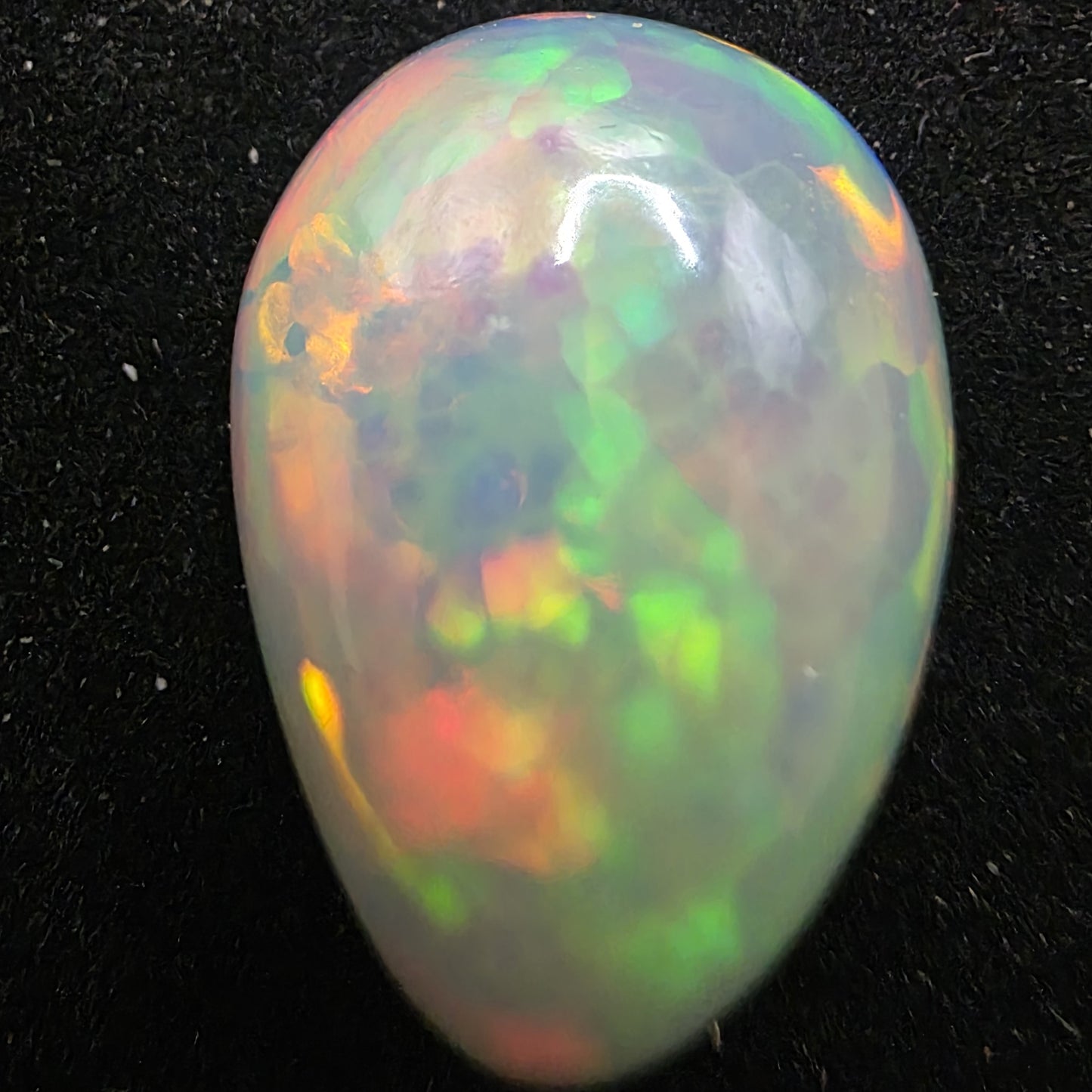White Opal special Ethiopian Welo, 10.85 ct pear polished, natural, intense Play-of-Colour
