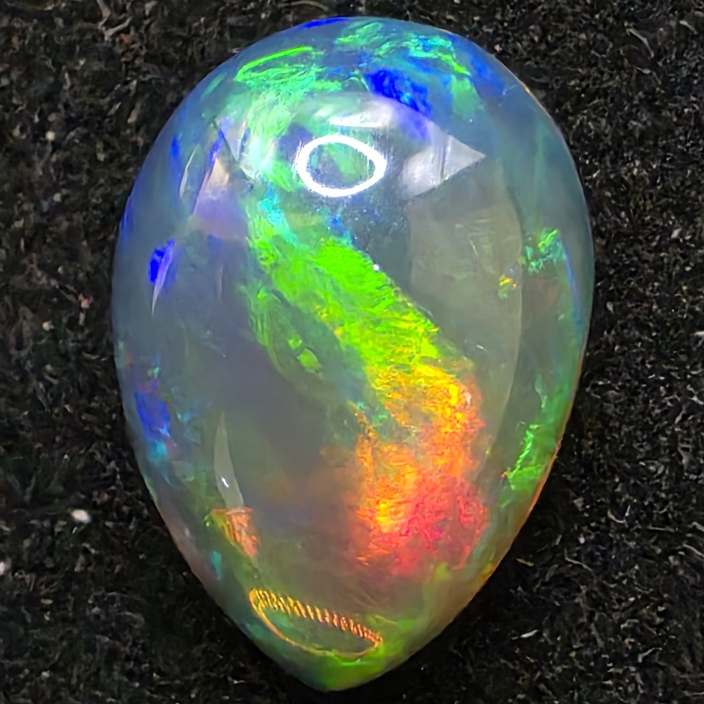 Black Opal special Ethiopian Welo, 3.45 ct pear polished, natural, intense Play-of-Colour
