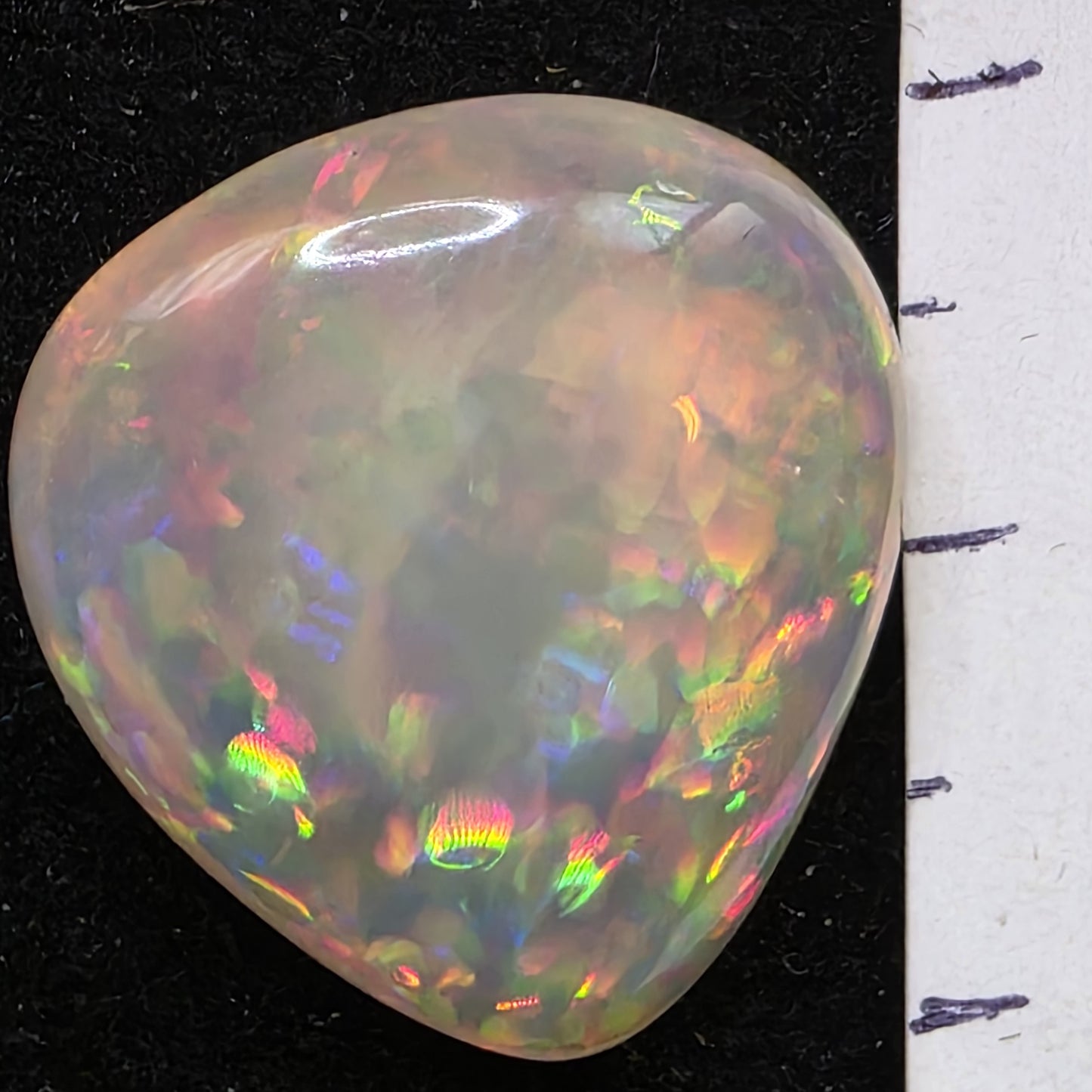 White Opal special Ethiopian Welo, 12.5 ct pear polished, natural, intense Play-of-Colour