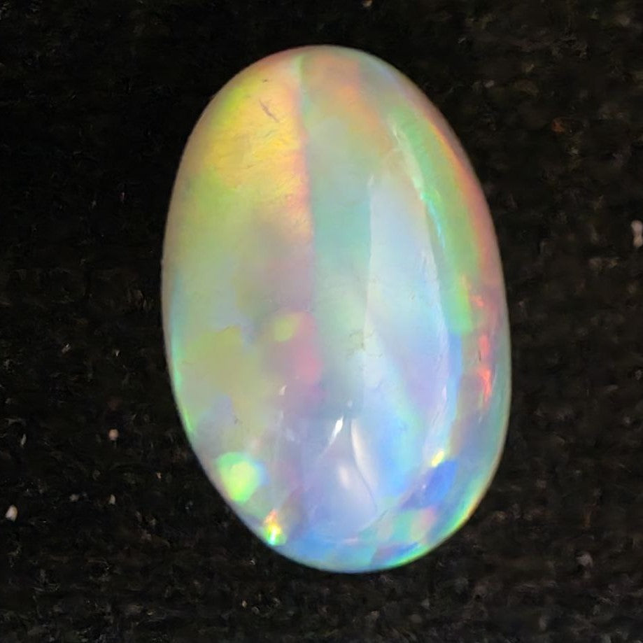 White Opal Ethiopian Welo, 5.95 ct oval polished, natural