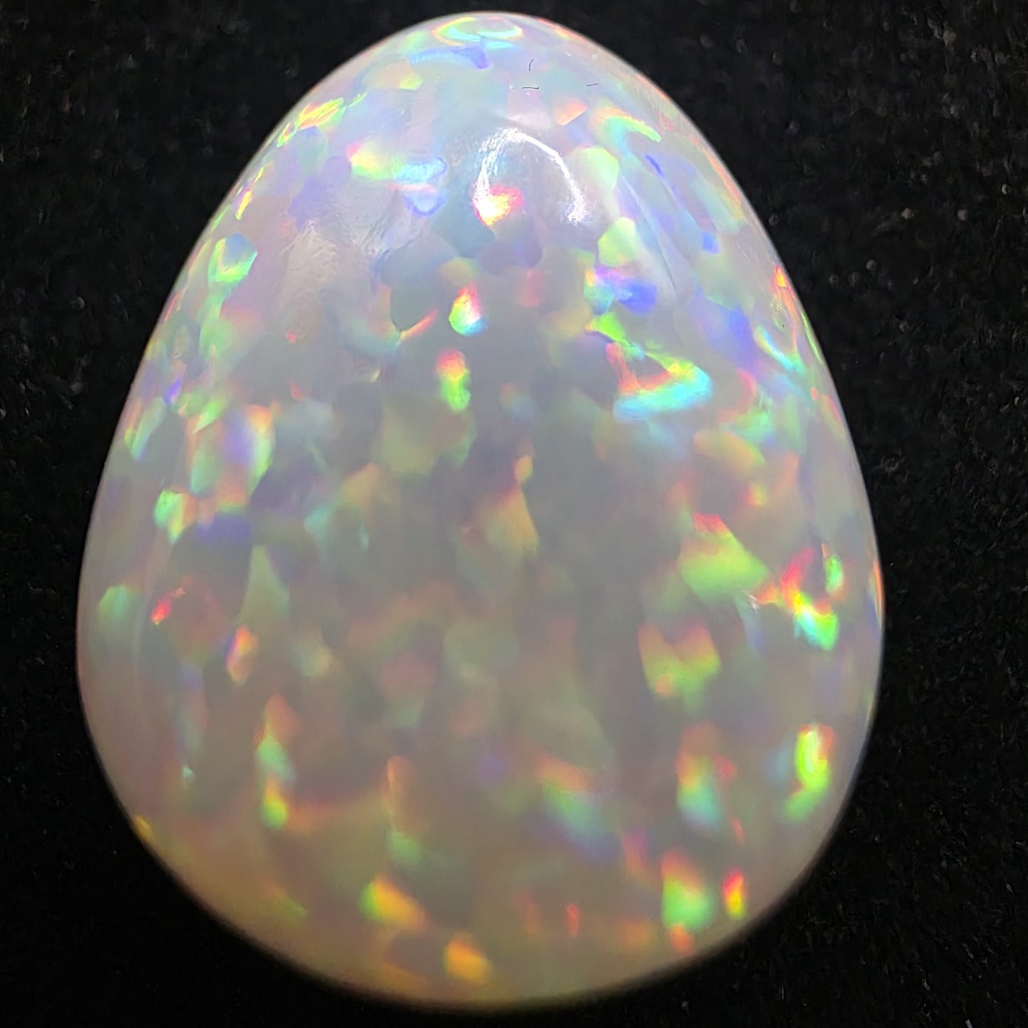 White Opal special Ethiopian Welo, 20.4 ct pear polished, natural, intense Play-of-Colour