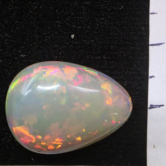 Black Opal special Ethiopian Welo, 9.55 ct pear polished, natural, intense Play-of-Colour