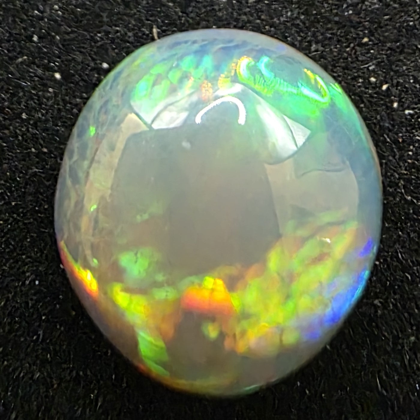 Black Opal special Ethiopian Welo, 5.75 ct round polished, natural, intense Play-of-Colour
