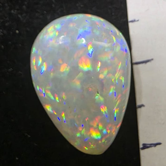 White Opal special Ethiopian Welo, 5.3 ct pear polished, natural, intense Play-of-Colour