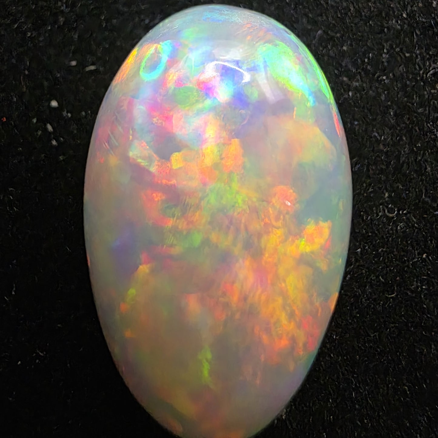 White Opal special Ethiopian Welo, 8.9 ct pear polished, natural, intense Play-of-Colour