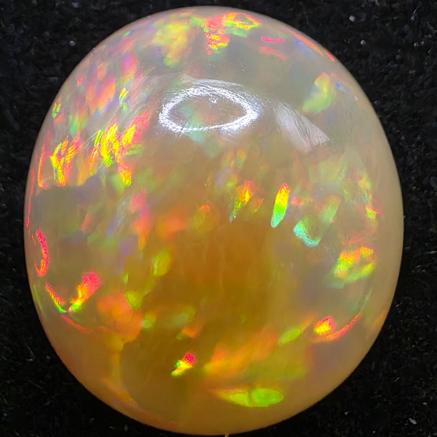 Honey Opal special Ethiopian Welo, 15 ct oval polished, natural