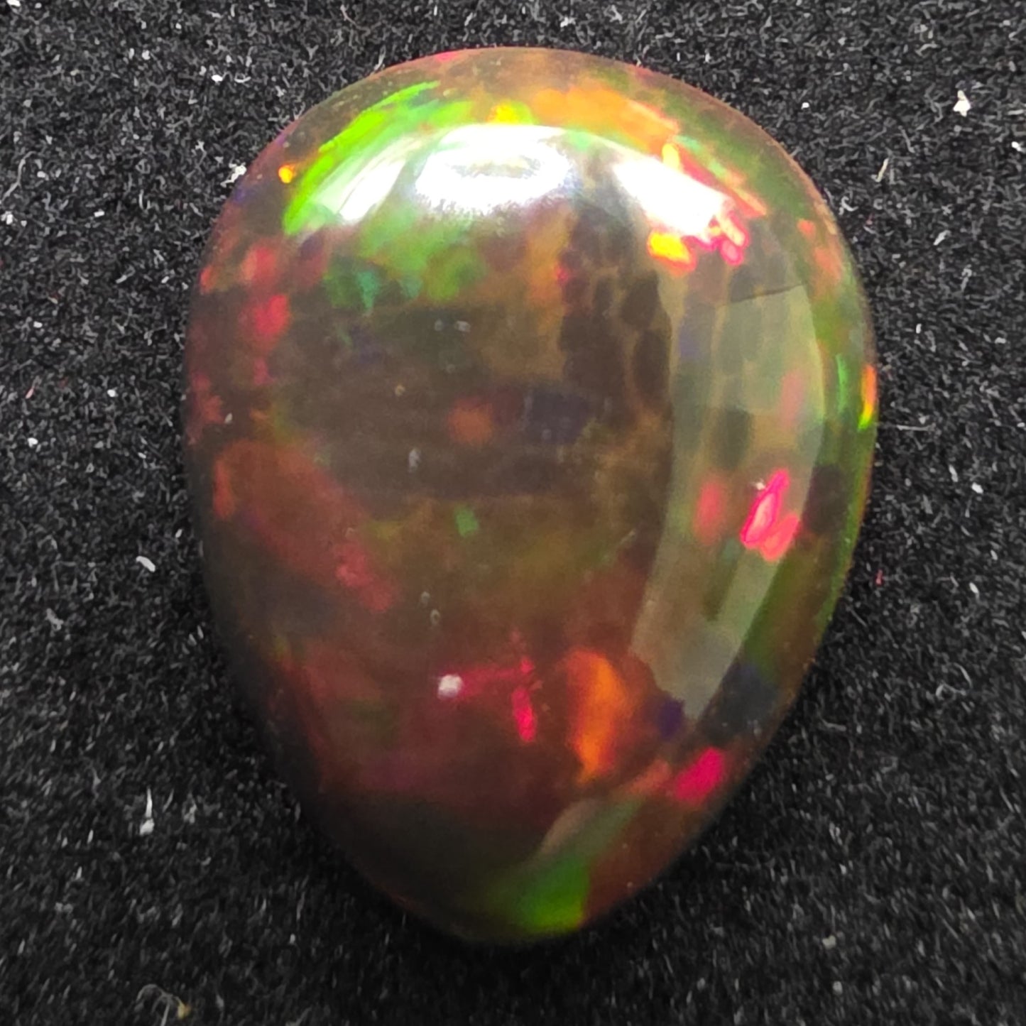 Black Opal special Ethiopian Welo, 4.7 ct pear polished, natural, intense Play-of-Colour